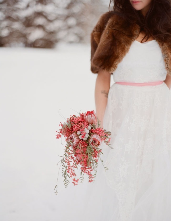 To see this beautiful bride's winter wedding, visit greenweddingshoes.com